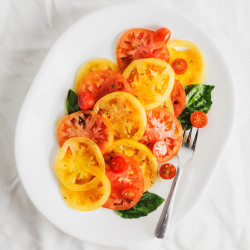 sliced tomatoes and basil